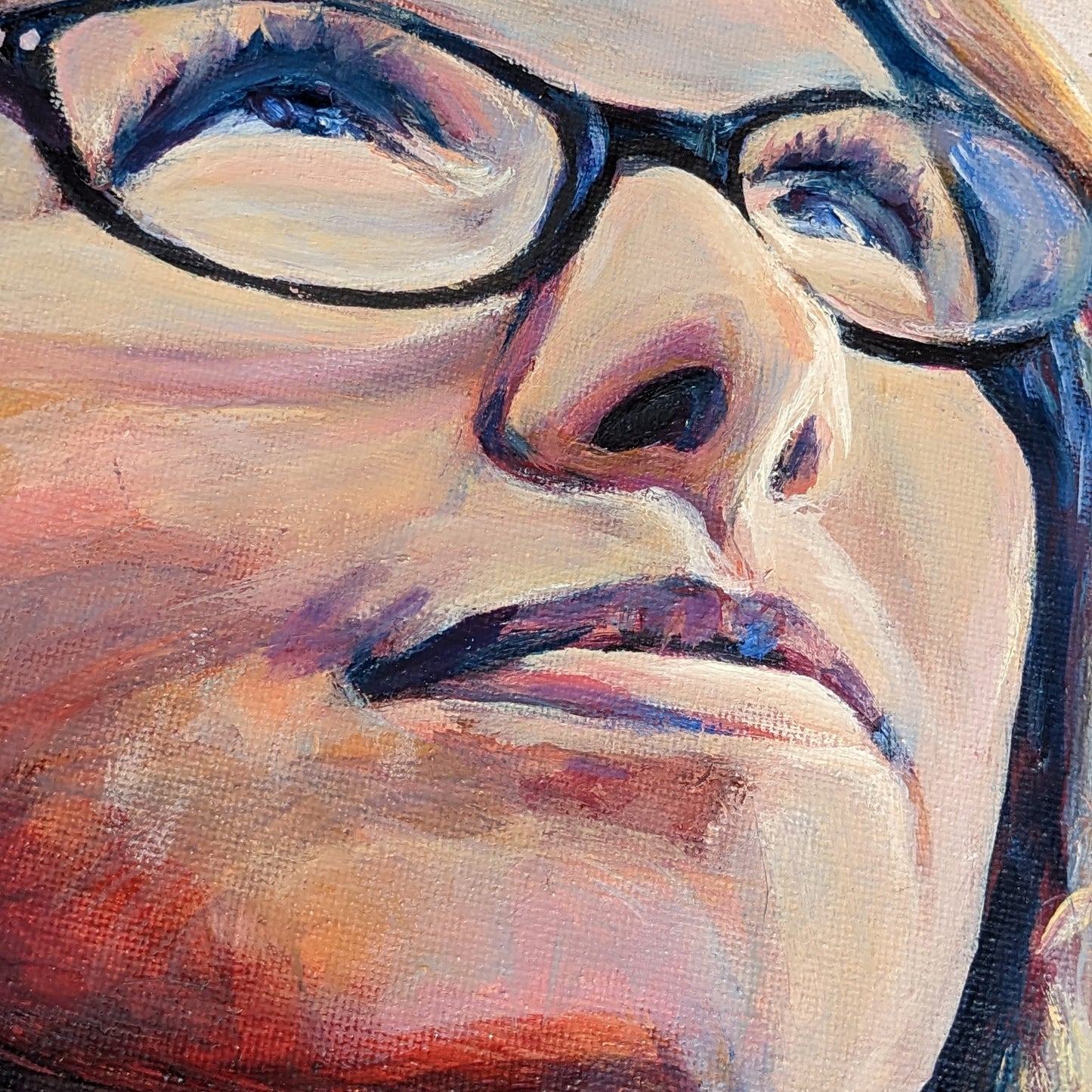 Self-portrait painting of woman looking upward in sunset light.