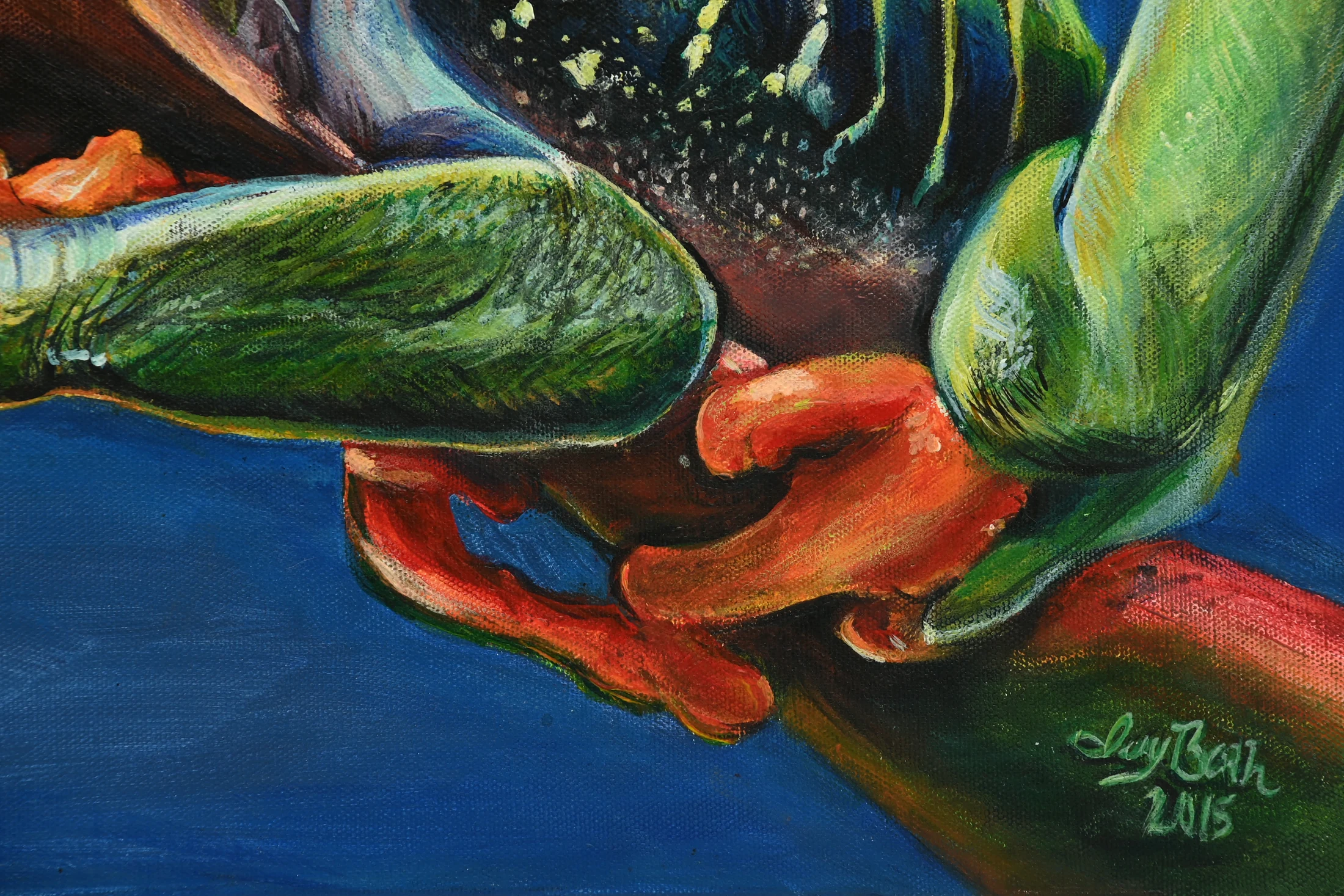 Close detail of the frog's orange feet and Ivy Bath signature in Prismatic Leap